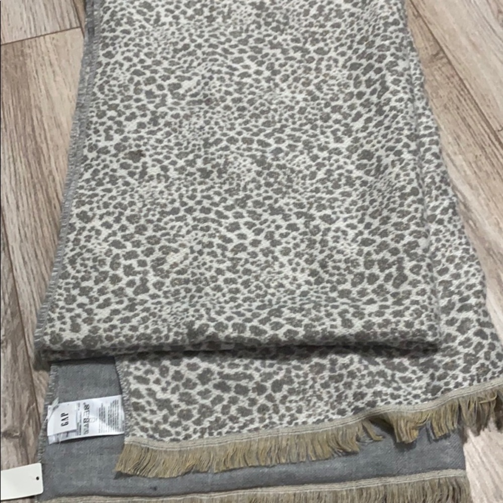 Leopard print, gray reversible blanket scarf.